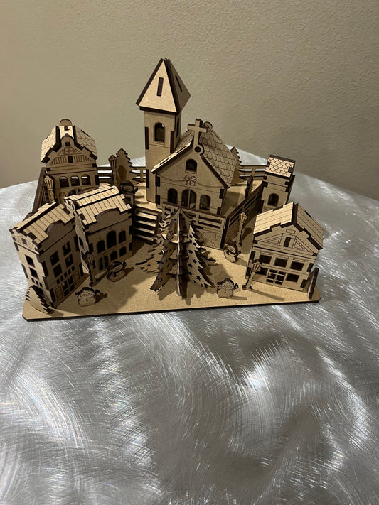 Miniature Christmas Town with Box Houses, a Church and a Christmas Tree